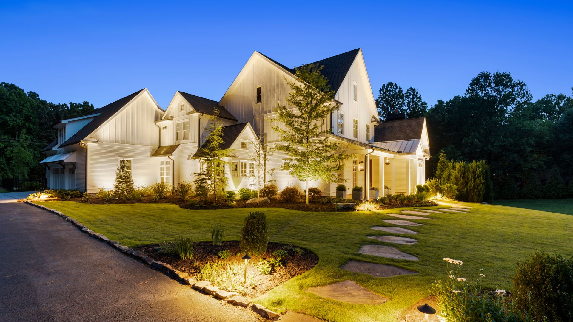 A house with a lawn and walkway