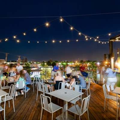 Chicken N Pickle Restaurant Rooftop Dining with String Lighting Photo