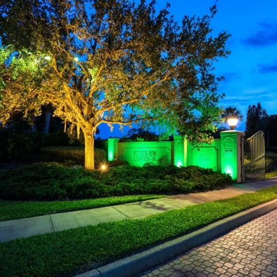 This HOA community added color-changing lighting to their entrance to welcome their residents and gu Photo