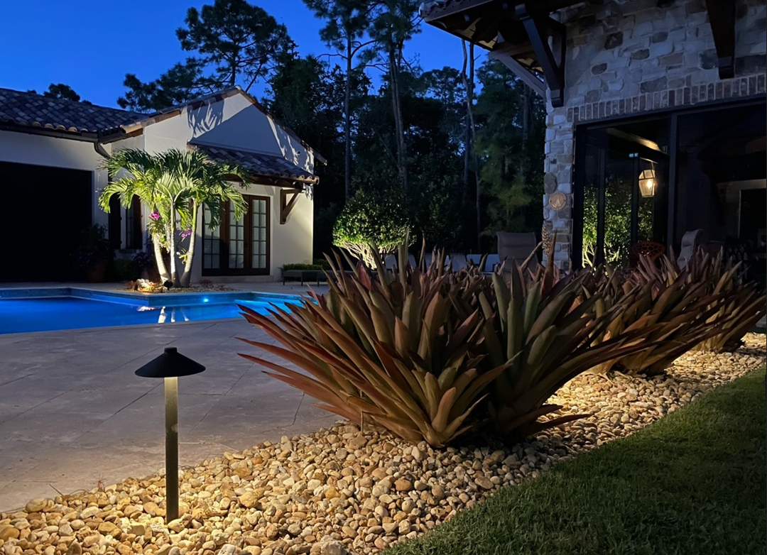 outdoor lighting surrounding pool and patio