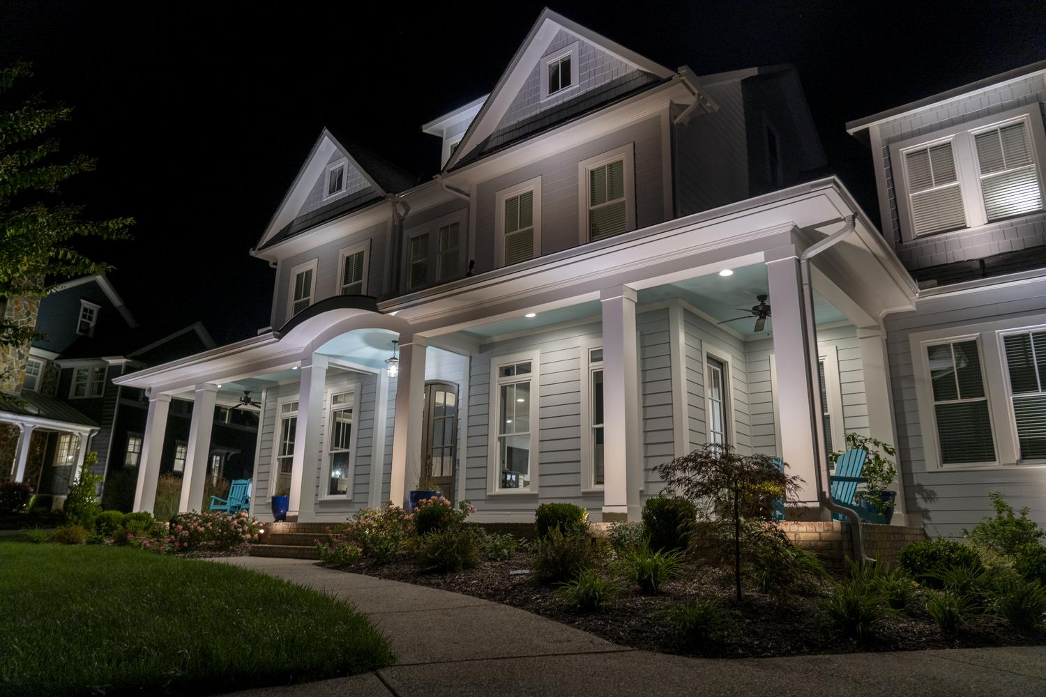 blue house exterior lighting