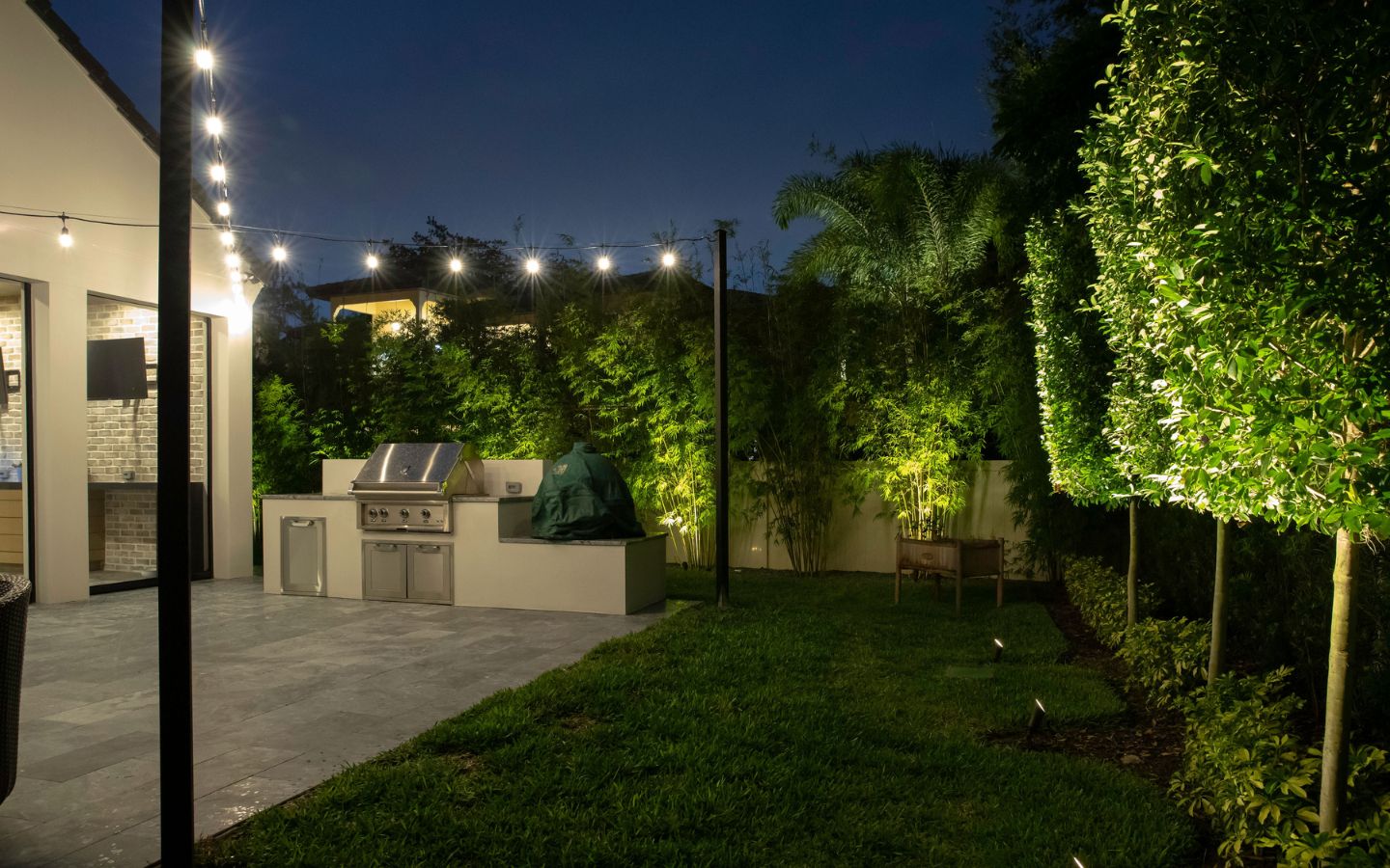 modern outdoor kitchen with lighting