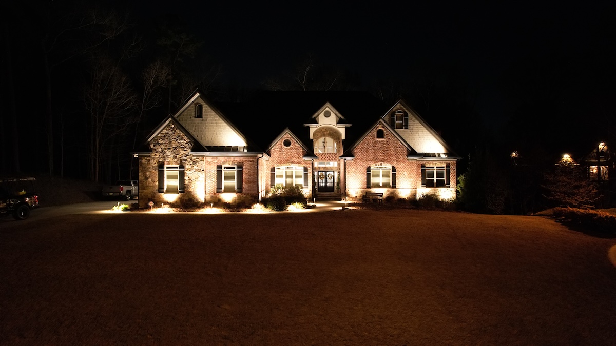 Large house lit up at night