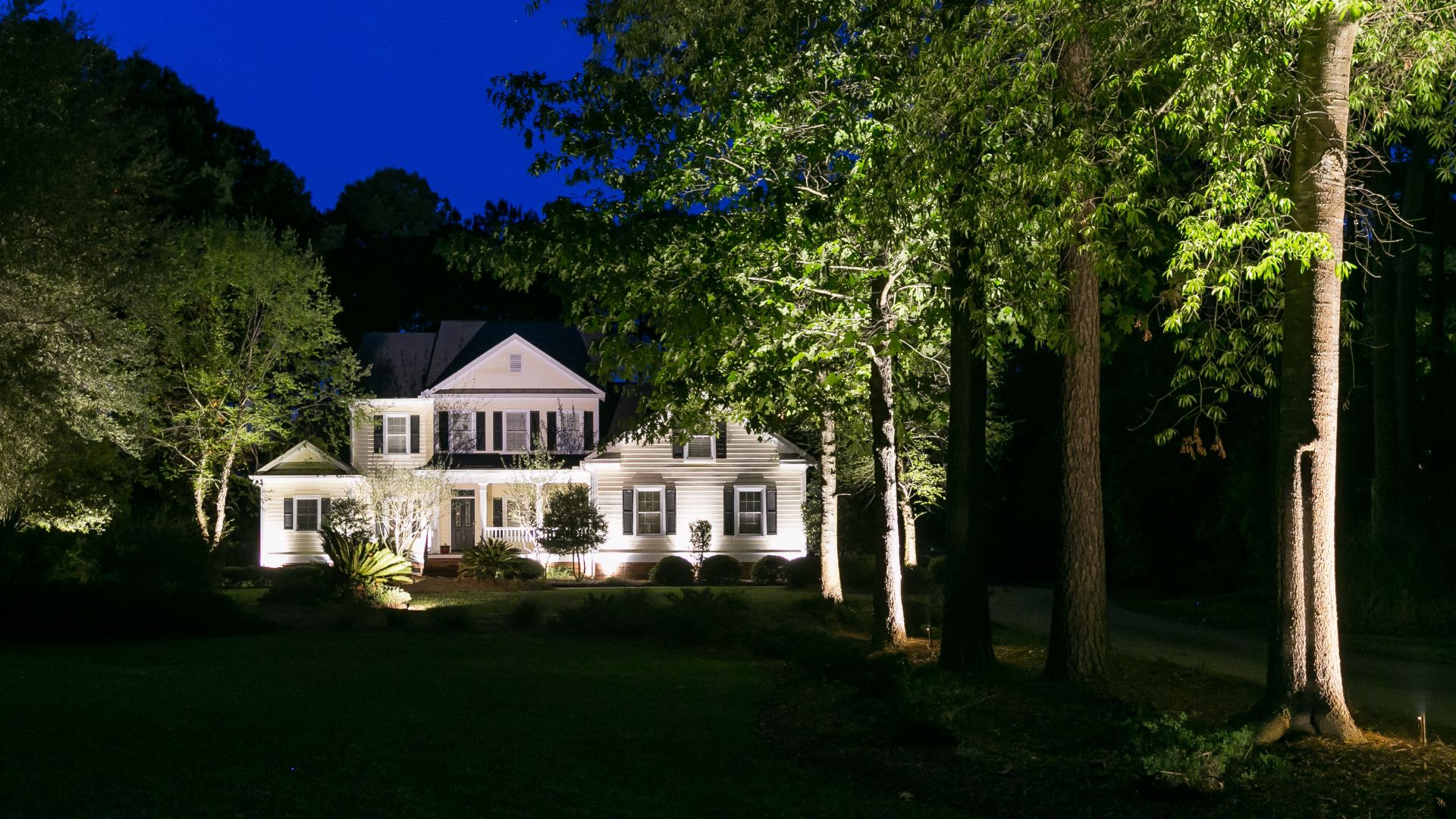 outdoor lighting on white house