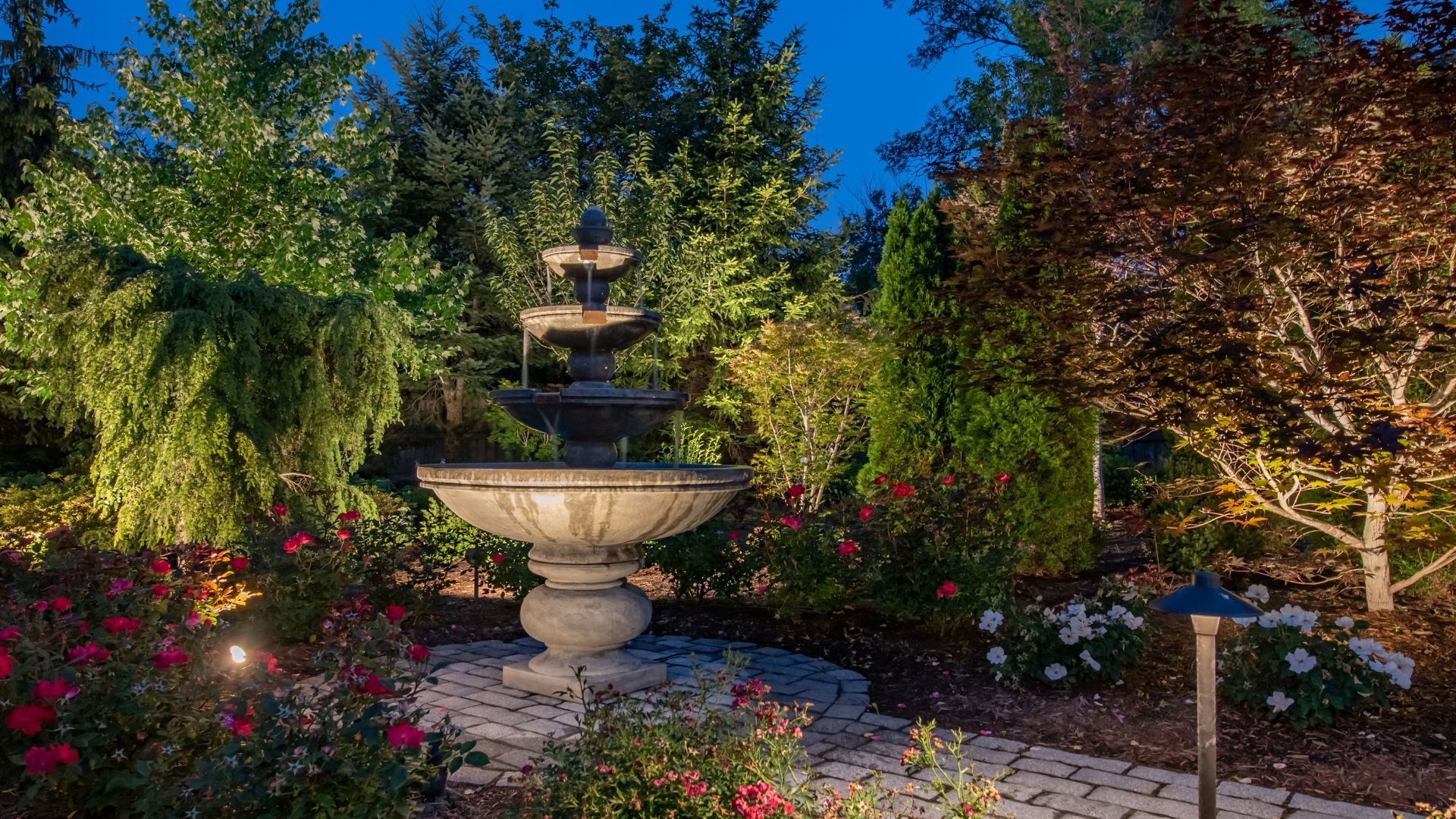 fountain with outdoor lighting