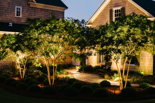 home with outdoor lighting