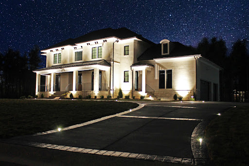 front of a house lit up